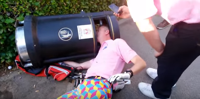 drunk golfer head in bin